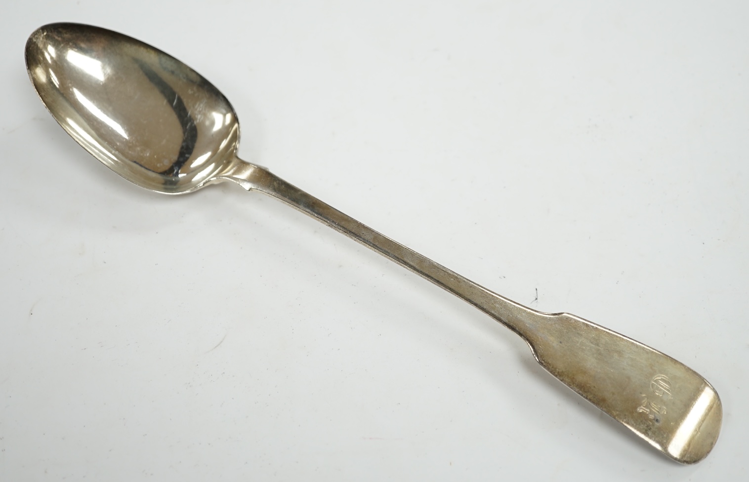 A William IV provincial silver fiddle pattern basting spoon, by Jonathan Ramsay, Exeter, 1831, with engraved initials, 30.5cm. Condition - fair